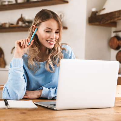Woman working on a laptop computer, representing the dental care centers new website