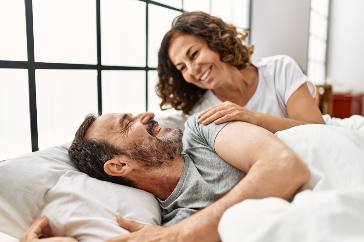 Customized-nightguards-eastern-north-carolina Couple resting comfortably with custom nightguard care from the dental care center serving zebulon, wake forest, fayetteville, greenville, smithfield, and wilson, north carolina.