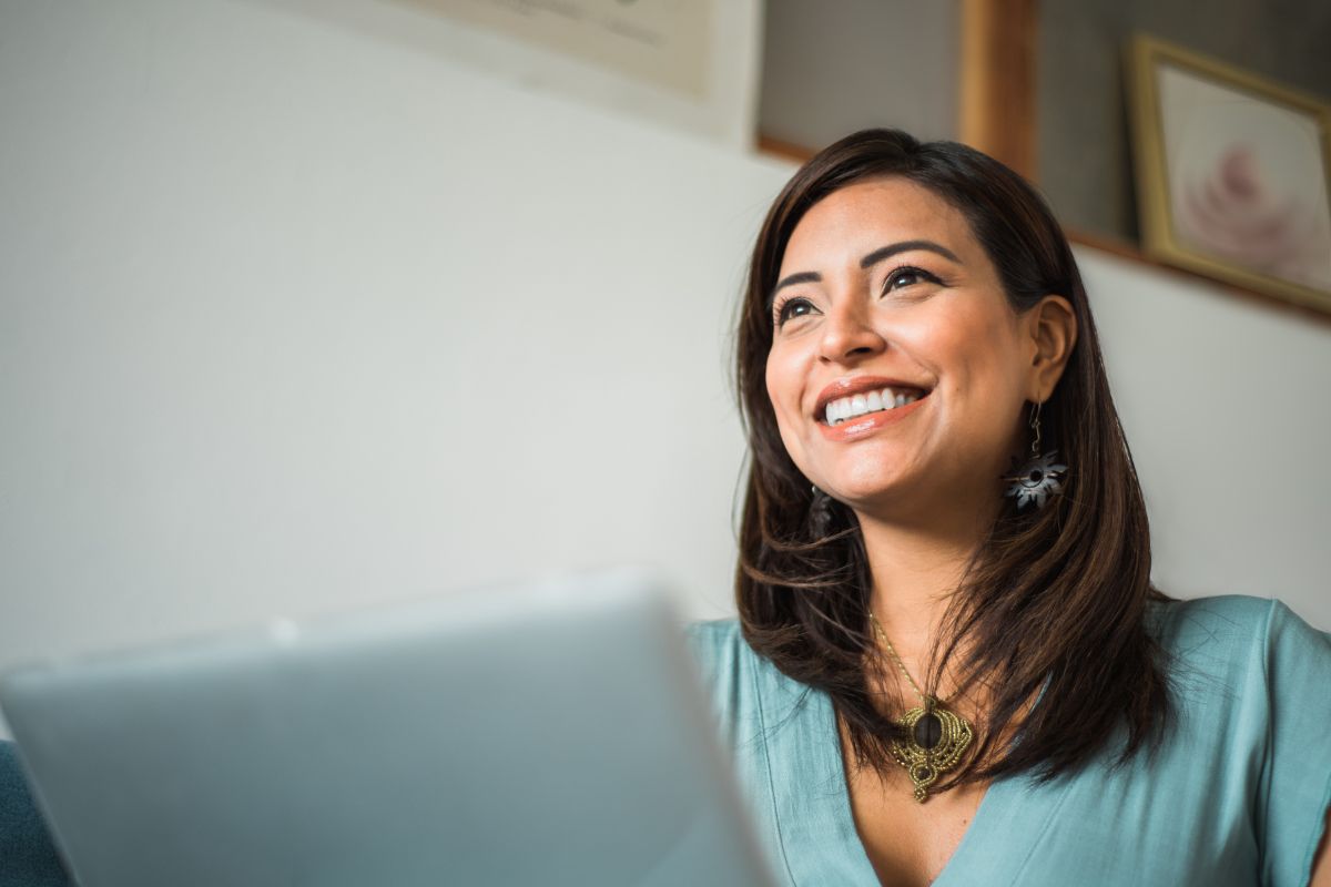 Expert-cosmetic-dental-bonding-eastern-north-carolina Happy patient after cosmetic dental bonding treatment to repair chipped and uneven teeth.