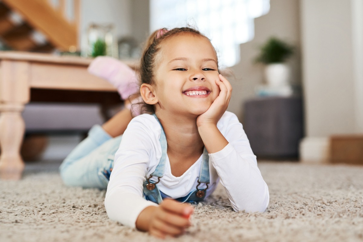 Child participating in pediatric dental care at the dental care center serving zebulon, wake forest, fayetteville, greenville, smithfield, and wilson, north carolina.