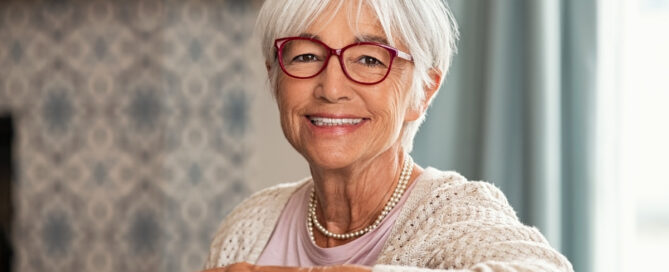 Placeholder 2 4 Smiling senior patient after restorative dentistry treatment to repair and strengthen teeth.