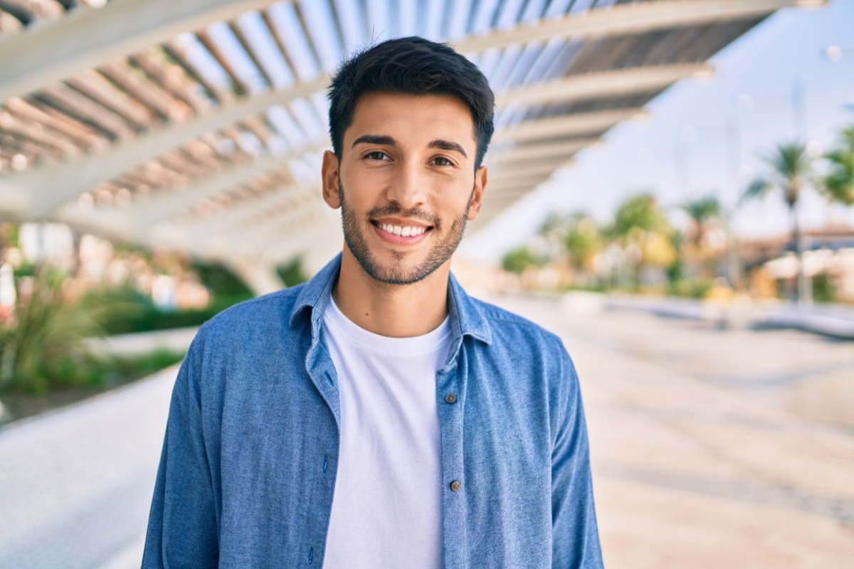 The-dental-care-center-teeth-whitening-benefits Patient enjoying teeth whitening results at the dental care center serving zebulon, wake forest, fayetteville, greenville, smithfield, and wilson, north carolina.