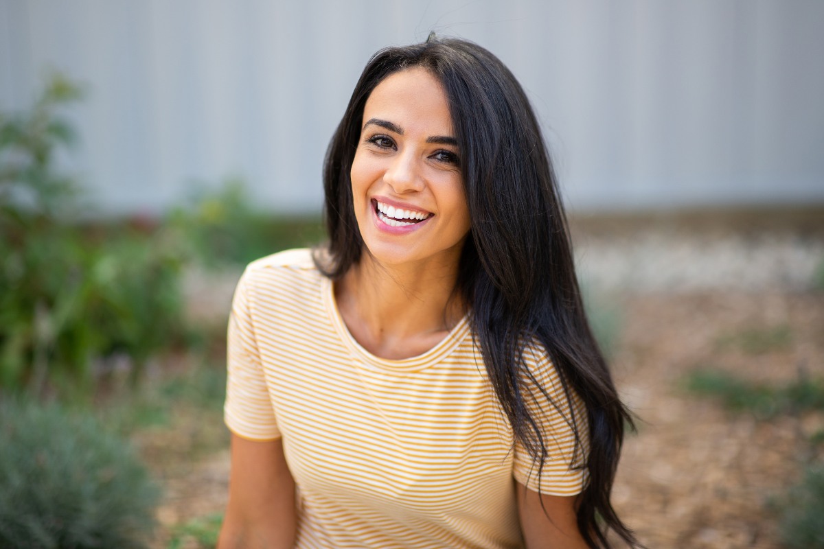 The-dental-care-center-teeth-whitening Smiling patient after professional teeth whitening at the dental care center serving zebulon, wake forest, fayetteville, greenville, smithfield, and wilson, north carolina.