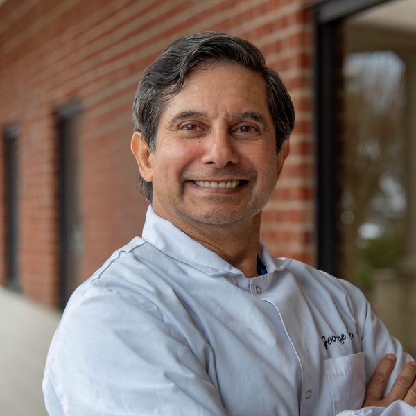 Top-rated greenville nc dentist dr. Mani providing expert dental services