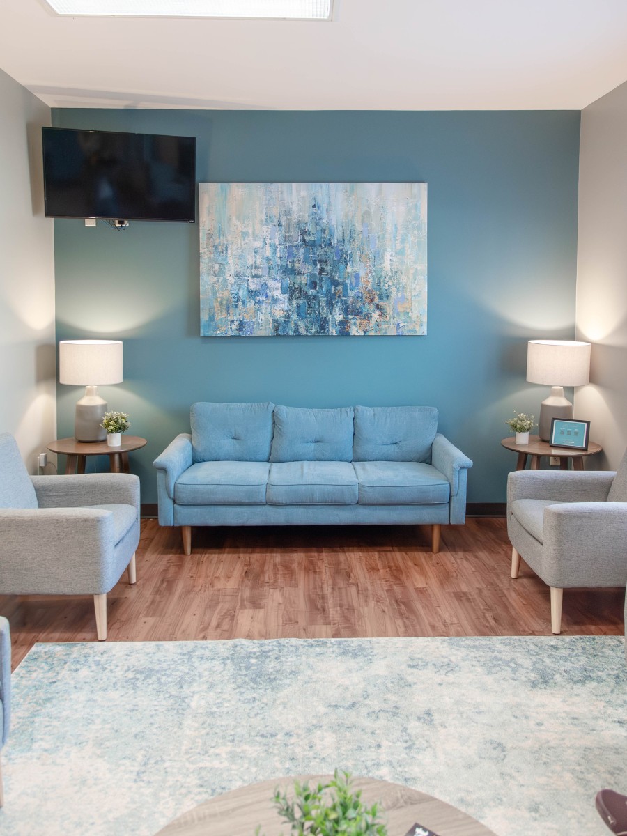The-dental-care-center-fayetteville-office-waiting-area Dental office waiting area in fayetteville nc with comfortable seating and modern decor for family dentistry patients