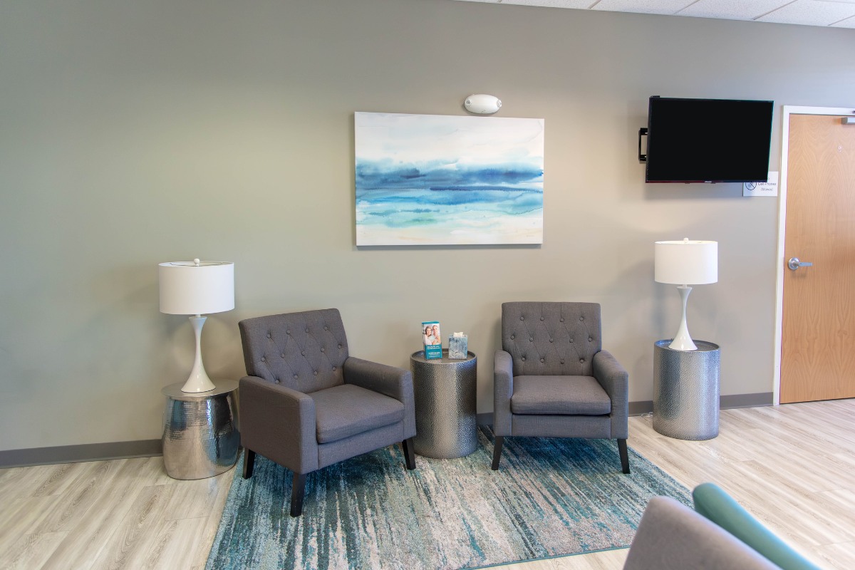 The-dental-care-center-smithfield-office-waiting-area Dental waiting area in smithfield nc with comfortable seating and modern decor for patients