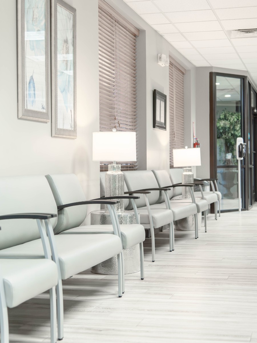 The-dental-care-center-wilson-office-lobby Dental office seating area in wilson nc with modern chairs for patient waiting area