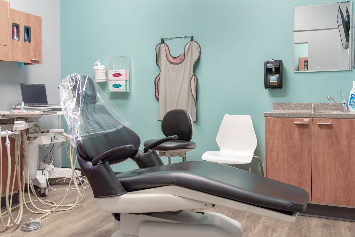 The-dental-care-center-zebulon-office-exam-room Dental exam room in zebulon nc with modern chair and equipment for family dentistry