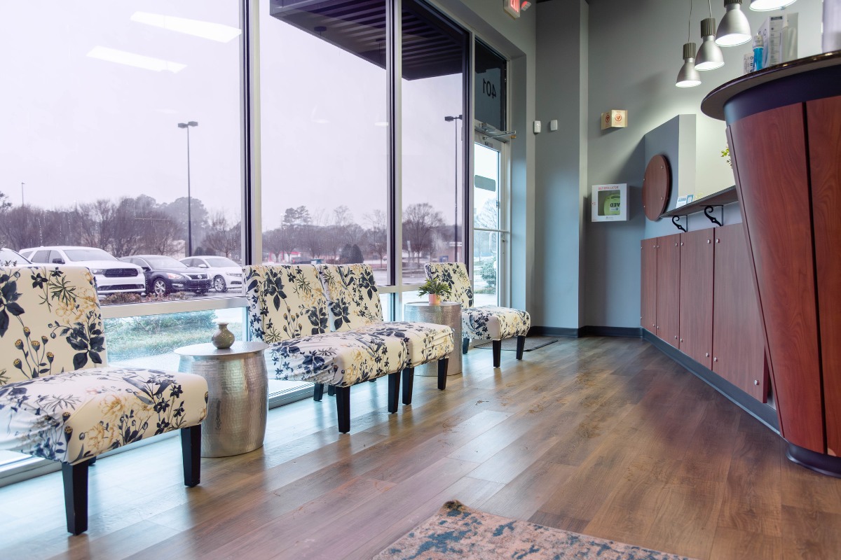 The-dental-care-center-zebulon-office-lobby Dental office lobby in zebulon nc with comfortable seating and large windows for patients
